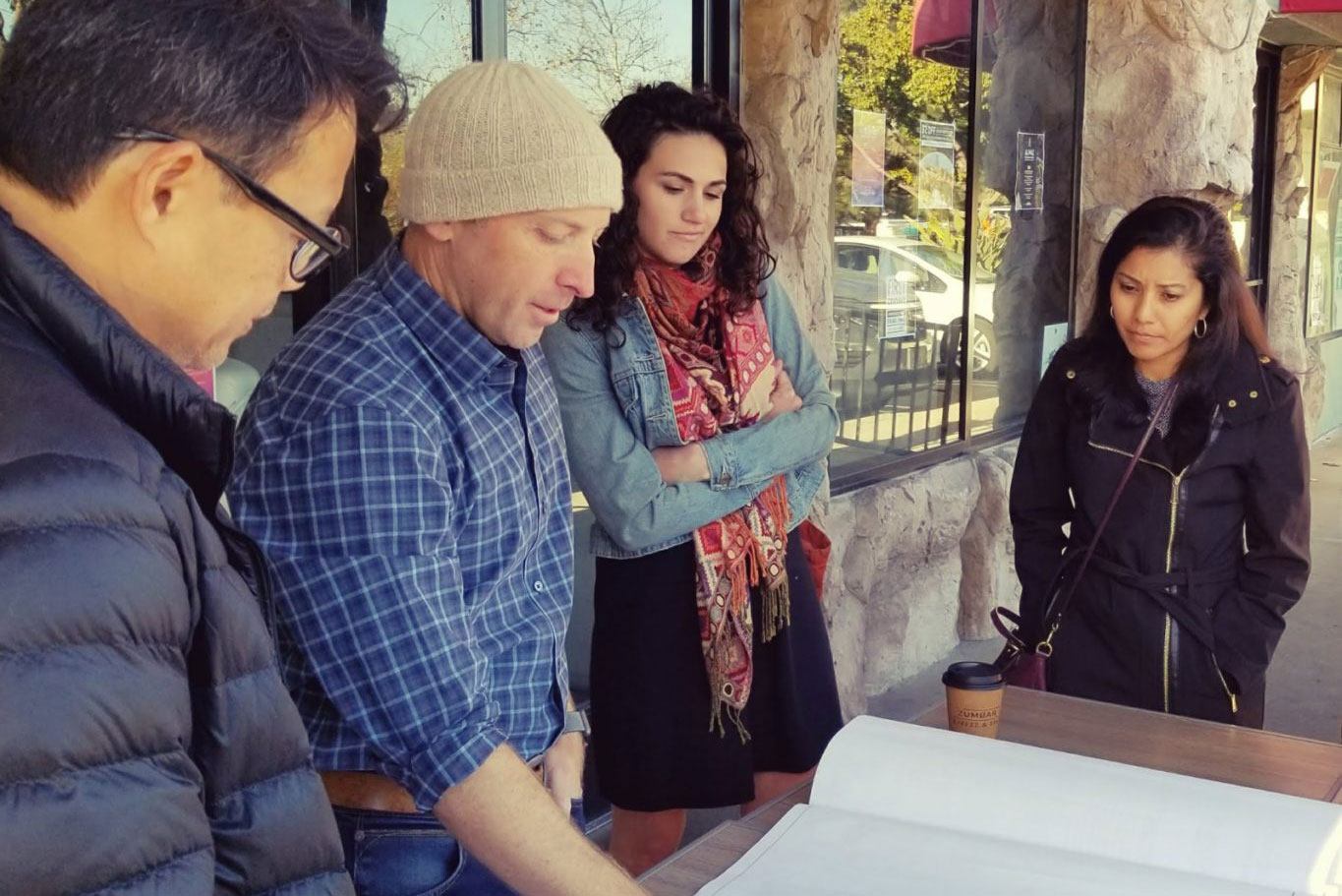 The LuckyBolt team reviews blue prints