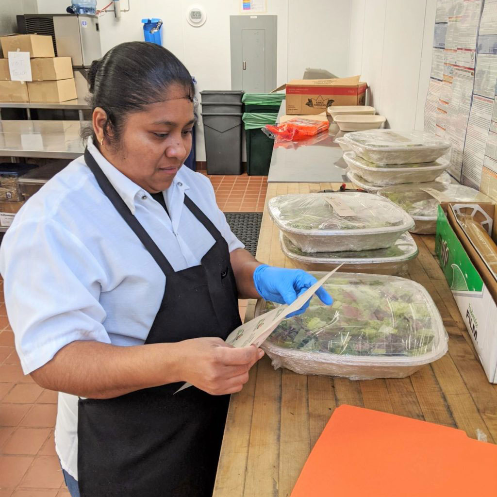 MDF_borrower-TTKProvisions_food-prep-crop catering staff work in a kitchen