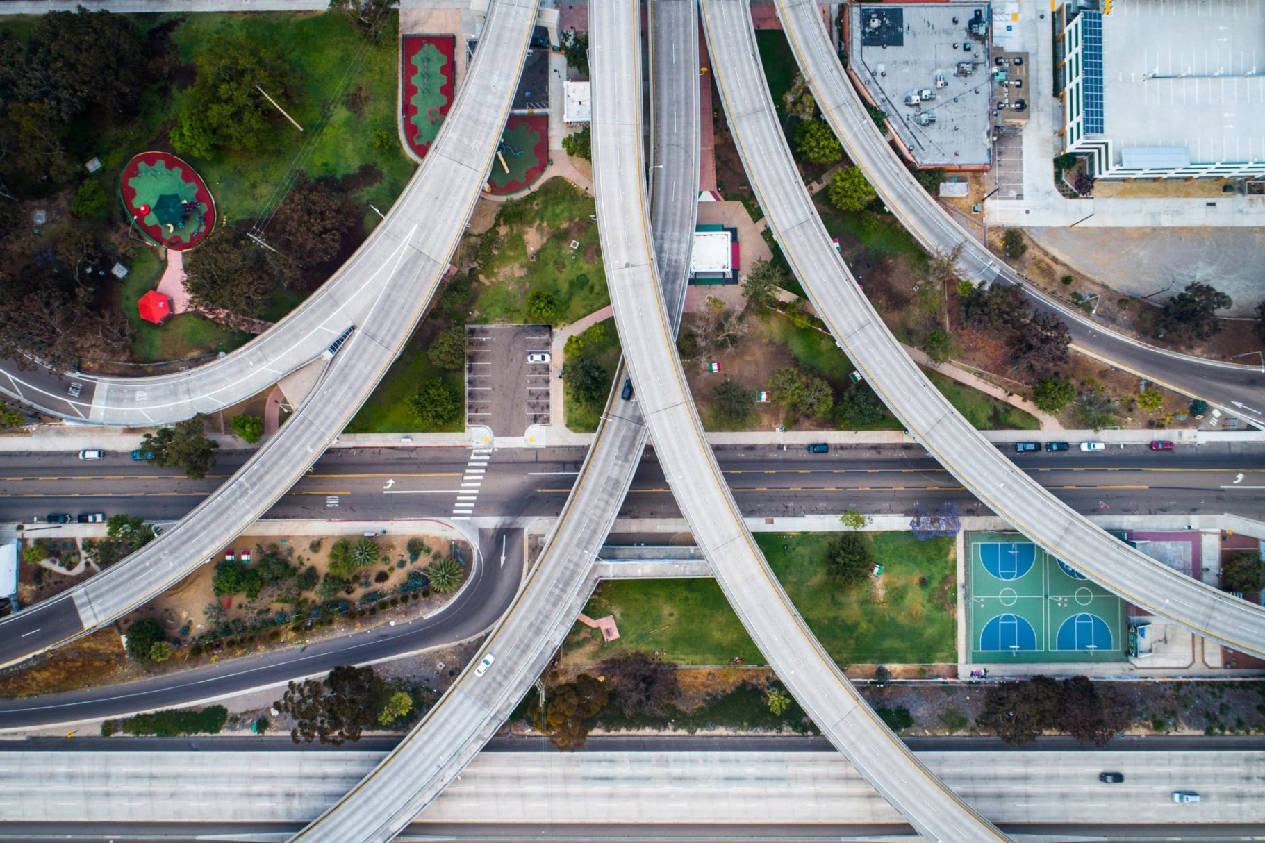 an aerial photo of intersecting roads and freeways