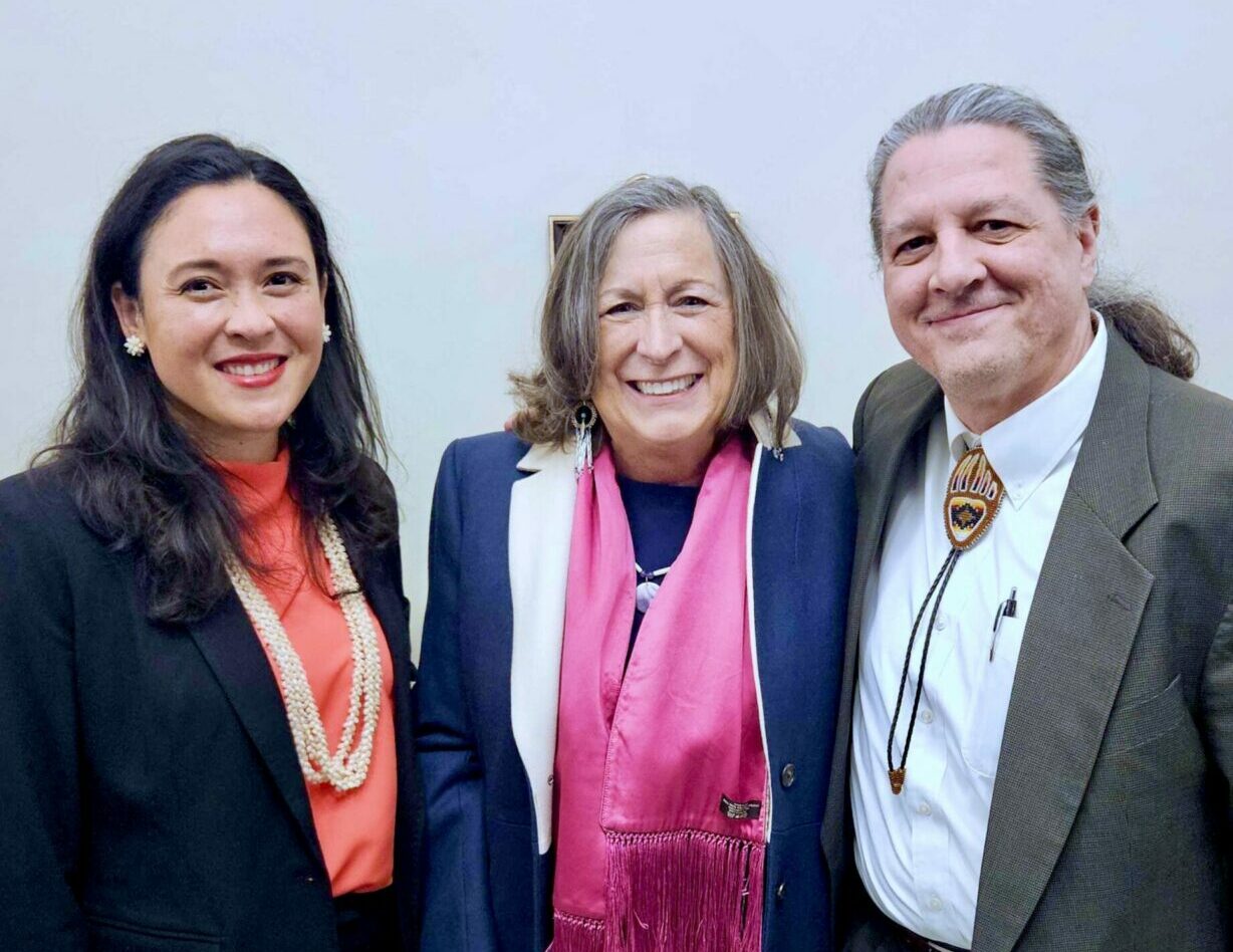Three people smile into the camera. L–R: Lauren Grattan, U.S. Treasurer Lynn Malerba, Ted Piccolo at the White House