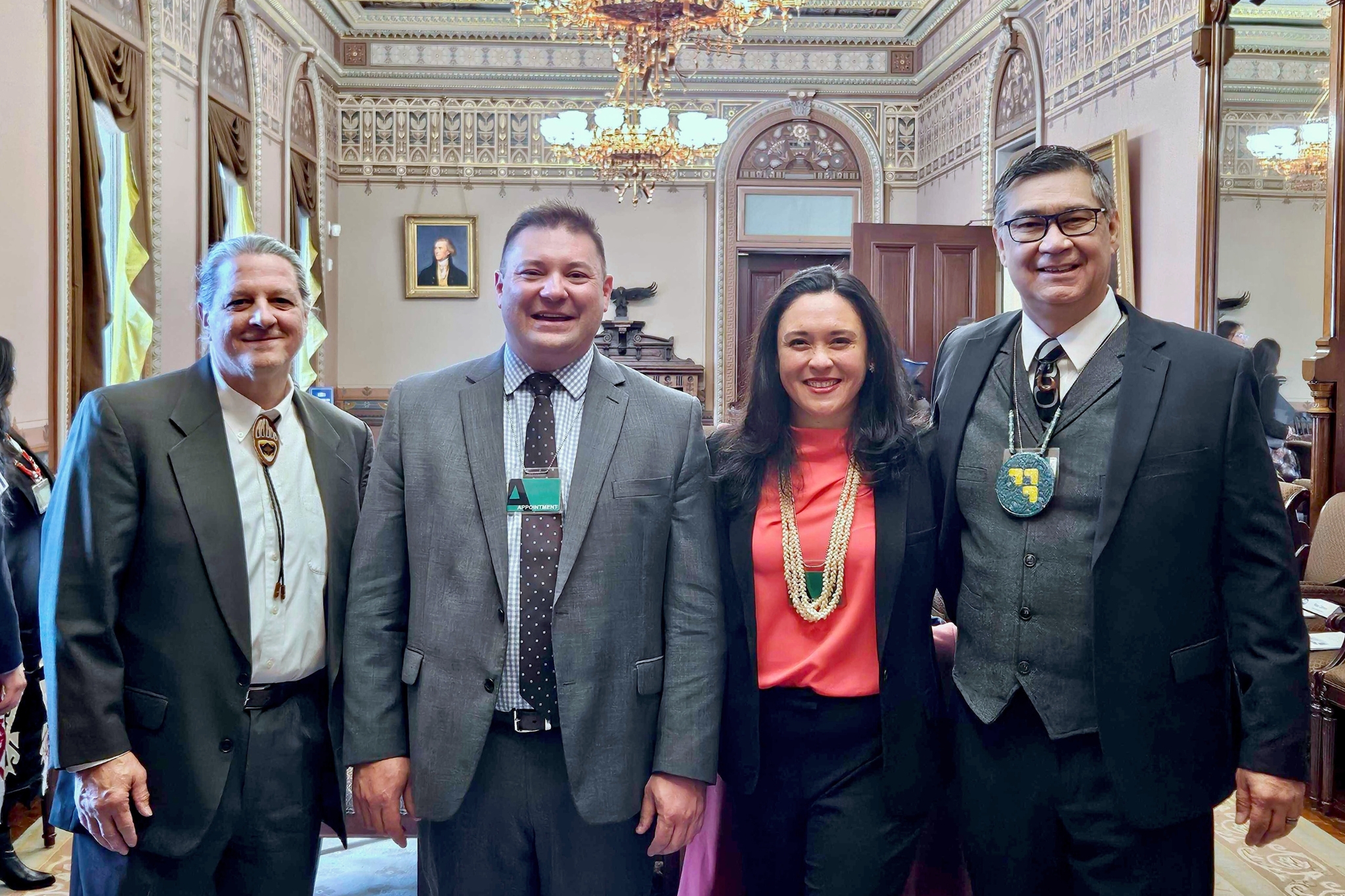 Four people in an ornate room smile into the camera. L–R: Dante Desiderio, Erik Stegman, Lauren Grattan, Ted Piccolo at the White House