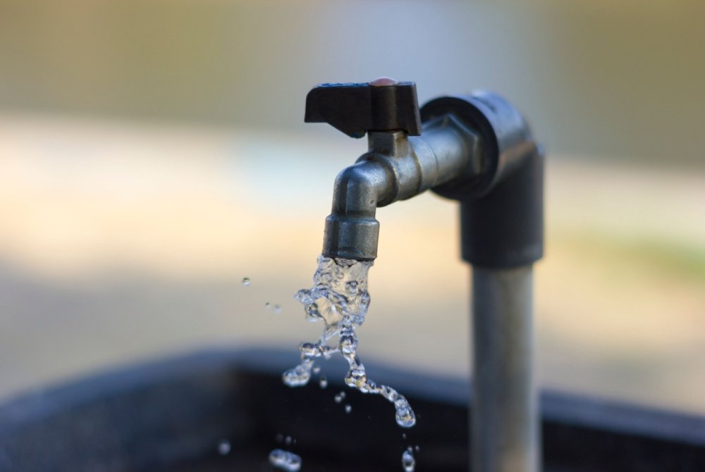 Water coming out of a spigot