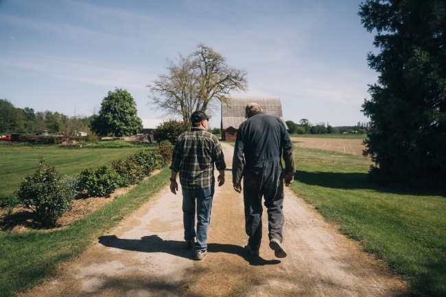 Two people walk on a path (Photo: Andrew Snyder, Cairnspring Mills)