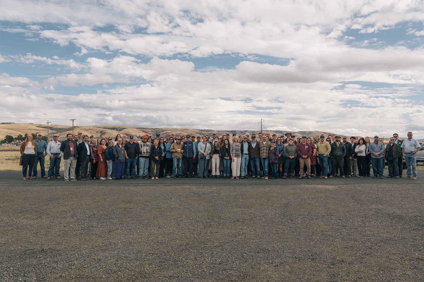 2025-10-01-Cairnspring-Umatilla-groundbreaking562139131_18392039701122721_6996061303729943109_n A group of people pose in a field