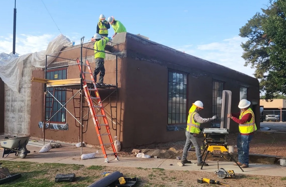 Workers with Avanyu LLC constructing a building