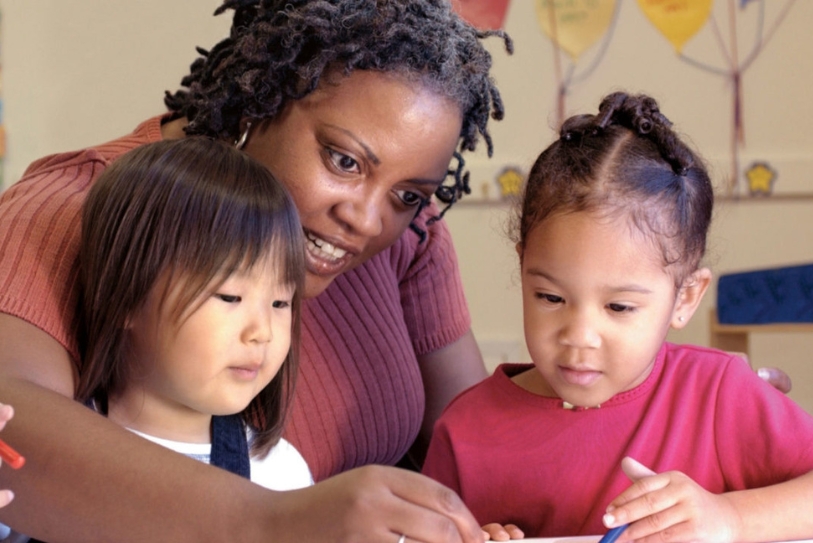 a child care provider with 2 children